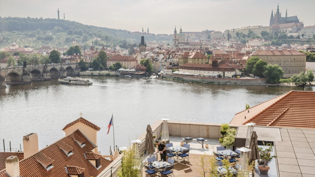 View of the Vltava River and Prague Castle from Four Seasons Hotel Prague, a perfect setting for afternoon tea in Prague during winter.