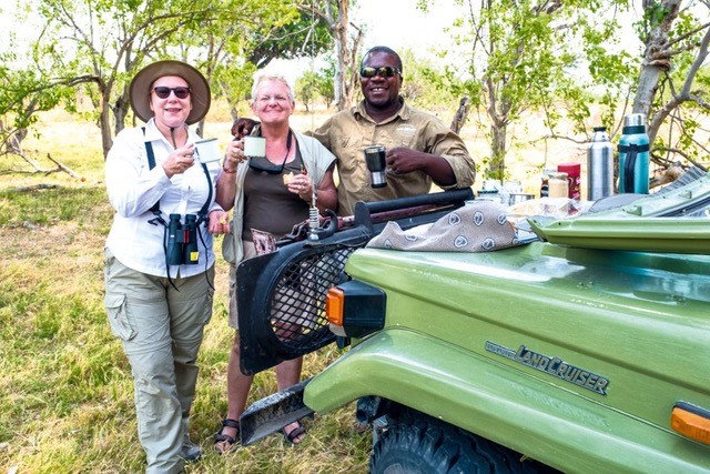  I woke up to the racket of frogs and crickets. When I looked out of my tent I saw the sky lightening. Then I heard the distant whoop of a hyena and the barking grunt of what I took to be a lion.