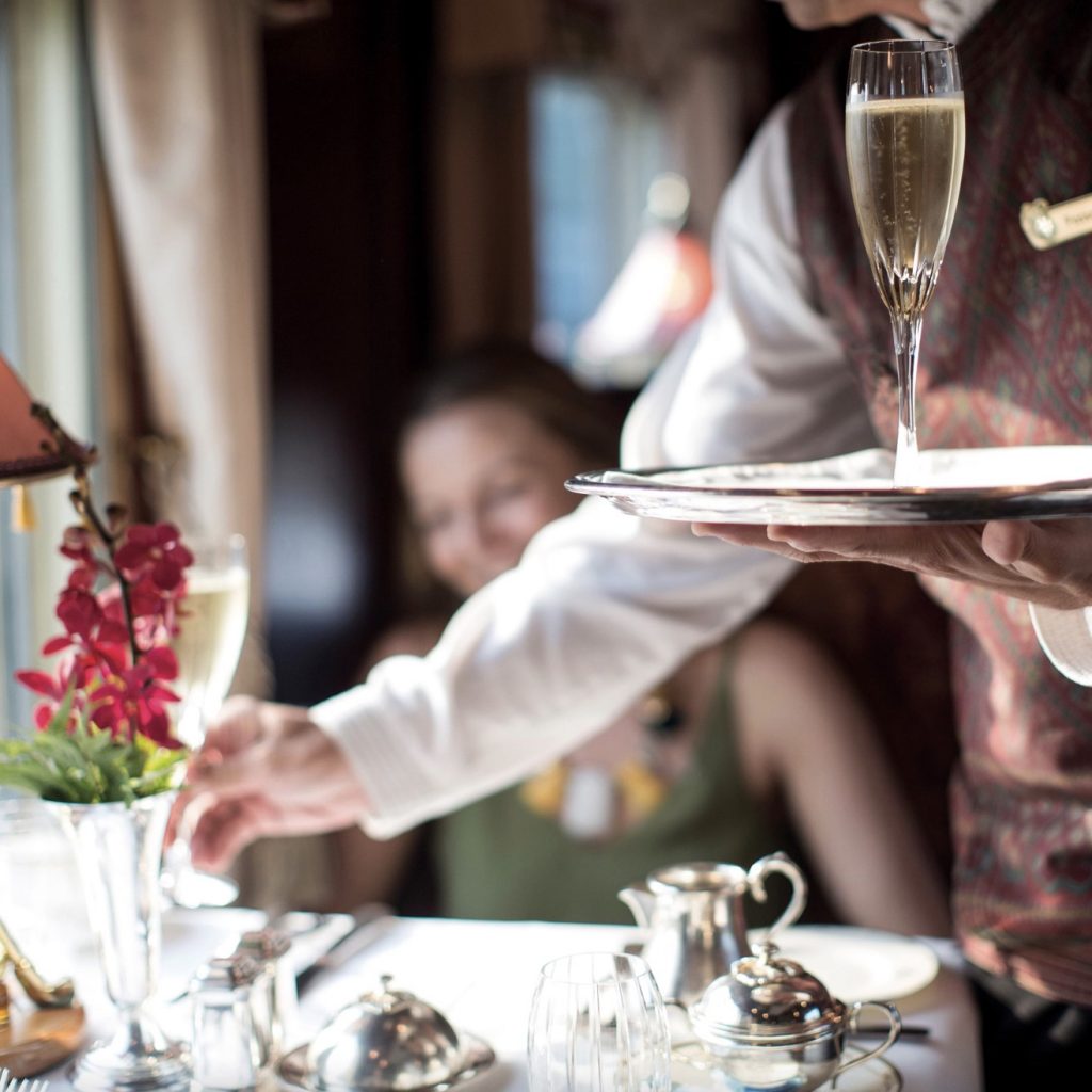 Champagne onboard on the Eastern & Oriental Express of Belmond. 