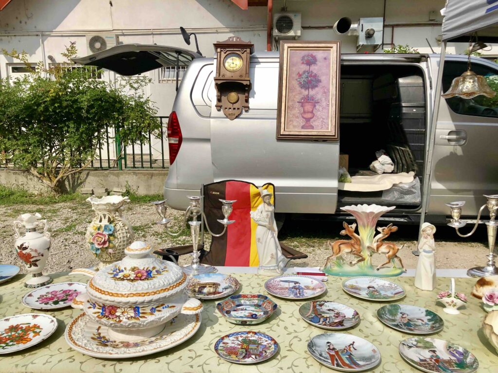 Hungary weekend market scene in Hévíz — locals browsing antique stalls and secondhand treasures.