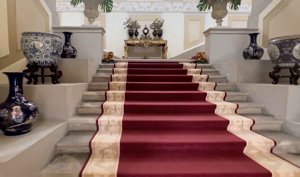 Grand staircase inside Passalacqua luxury hotel on Lake Como, Italy