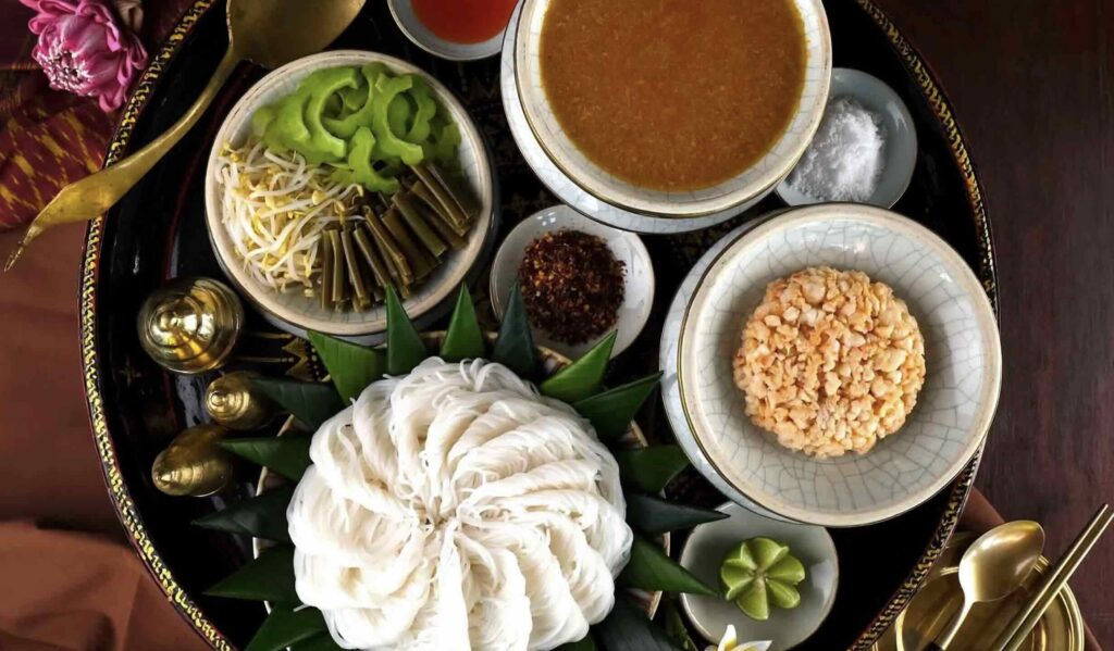 Discover the best restaurants in Phnom Penh and the food culture of Cambodia with Travelife Magazine via a curated itinerary that includes a stay at the Raffles Le Royal Hotel.