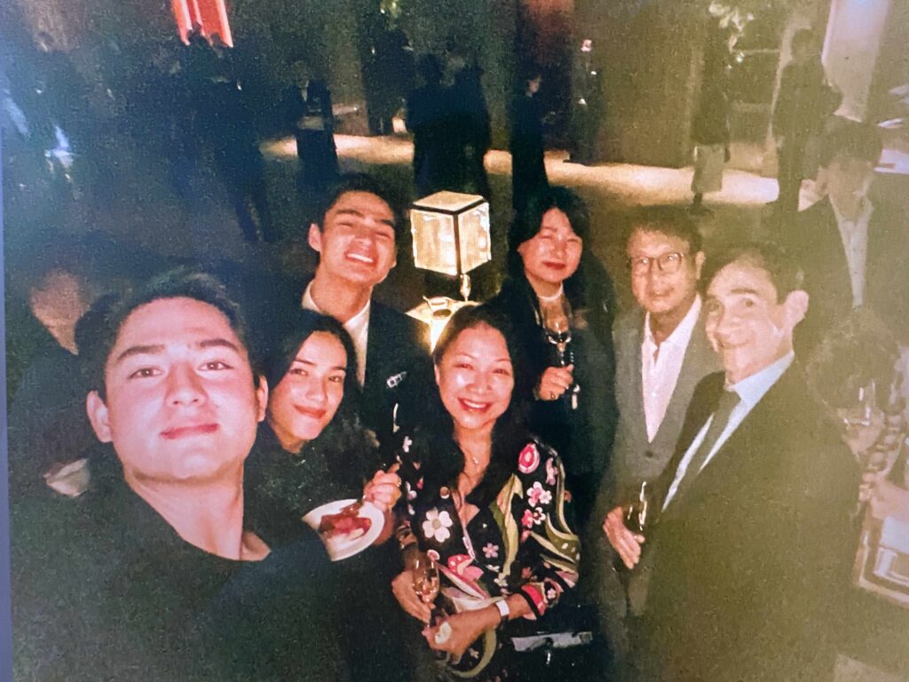 Guests, including former Park Hyatt Tokyo Assistant General Manager Ernesto de Lima and Travelife Magazine Publisher Christine Cunanan, share a celebratory moment at the reopening party of Park Hyatt Tokyo, raising glasses amid the warm glow of the bamboo atrium — a night of nostalgia, renewal, and elegant hospitality high above the city skyline.
