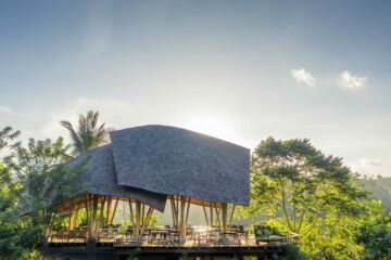 Luxury glamping pavilion at Buahan, a Banyan Tree Escape in Bali, featuring an open-air design surrounded by tropical rainforest in the Payangan Highlands near Ubud