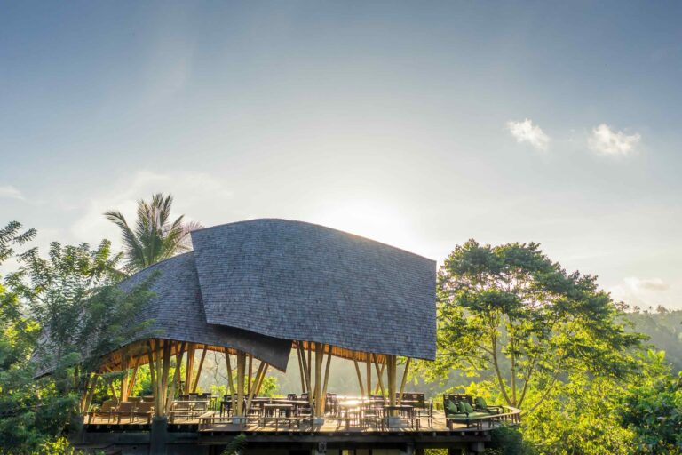 Luxury glamping pavilion at Buahan, a Banyan Tree Escape in Bali, featuring an open-air design surrounded by tropical rainforest in the Payangan Highlands near Ubud