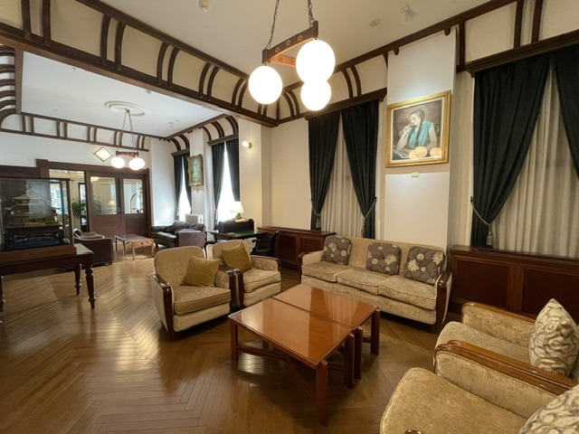 Elegant sitting room in the heritage wing of Fujiya Hotel Hakone featuring original woodwork, period furnishings, and classic Japanese-Western design