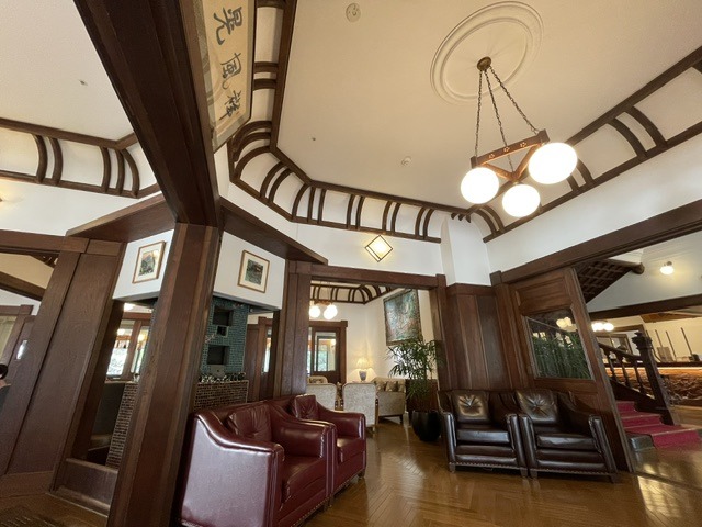 Historic lounge in the heritage wing of Fujiya Hotel Hakone featuring original timber beams, period lighting, and classic architecture
