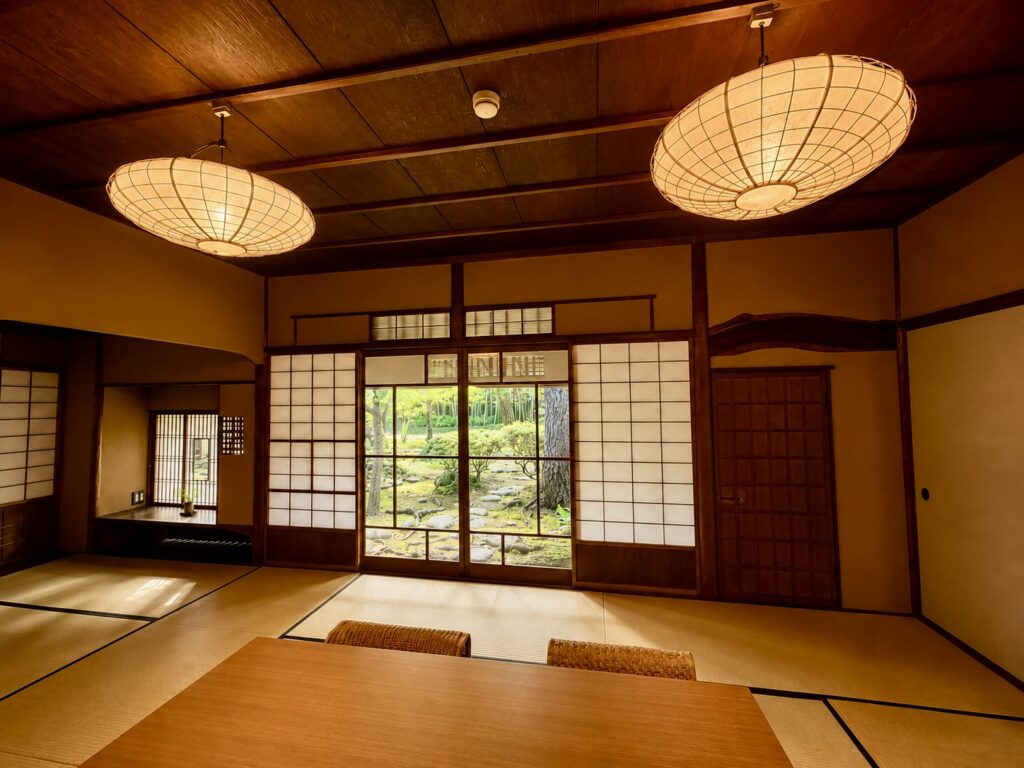 Traditional Japanese tatami room in the historic heritage house at Numazu Club, Shizuoka, Japan, overlooking the estate’s tranquil gardens. Photographed by Travelife Magazine.
