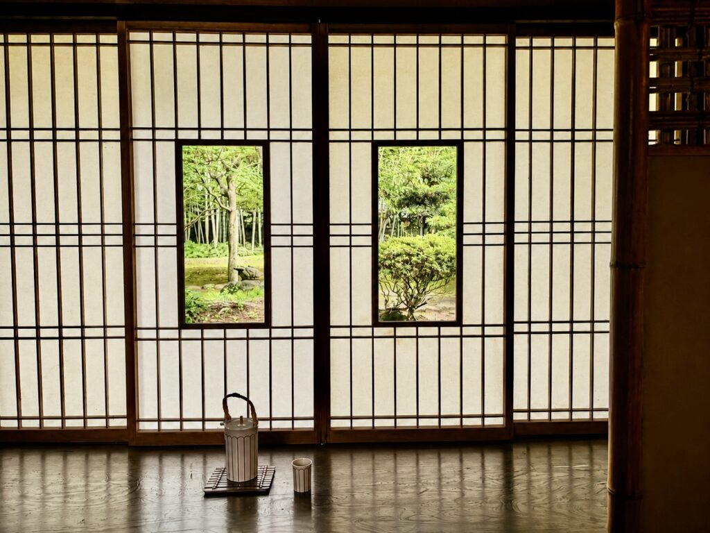 Shoji paper screens and garden windows inside the heritage house at Numazu Club, a Michelin One-Key luxury hotel in Numazu, Japan. Photographed by Travelife Magazine.