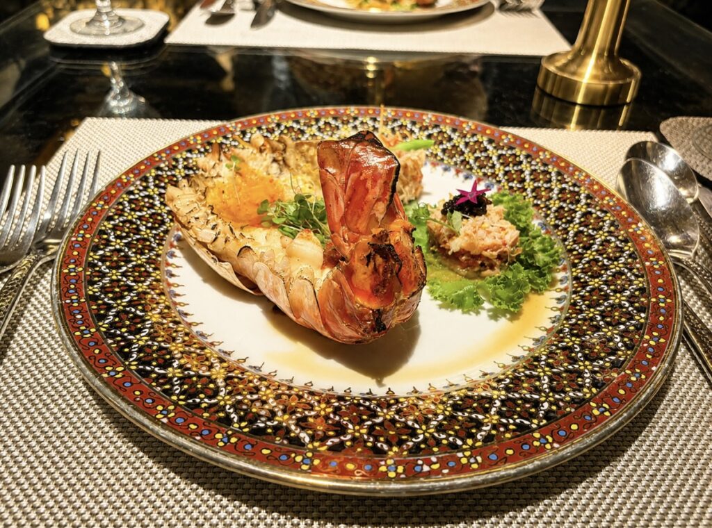 Thai fine dining course served aboard Loy Dream of Anantara Hotels during a luxury Bangkok river cruise