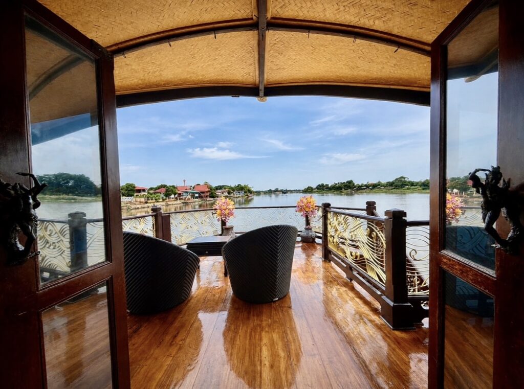 Upper deck of Loy Dream Bangkok river cruise of Anantara Hotels and Loy Pela Voyages overlooking the Chao Phraya River 