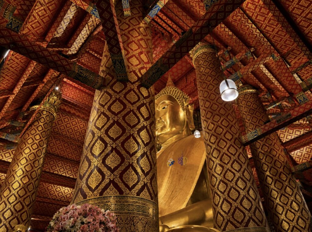 Golden Buddha inside an Ayutthaya temple, visited during the Loy Dream Bangkok river cruise by Anantara Hotels
