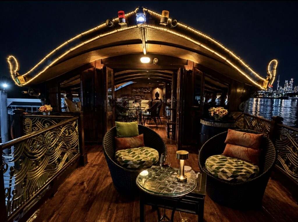 Candlelit dinner aboard Loy Dream of Anantara Hotels during a private Chao Phraya River cruise