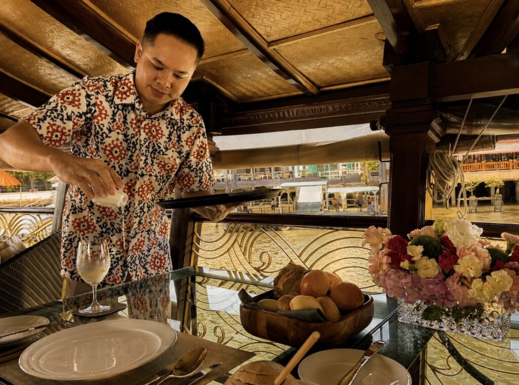 Lunch service aboard Loy Dream during an Anantara cruise on the Chao Phraya River