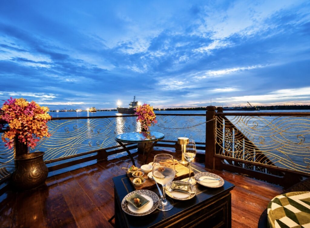 Evening drinks and canapés on the deck of Loy Dream of Anantara Hotels and Loy Pela during a Chao Phraya River cruise from Bangkok to Ayutthaya